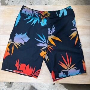 Boys Billabong Swim trunks suit blue with vibrant pattern, size 27, 17” length